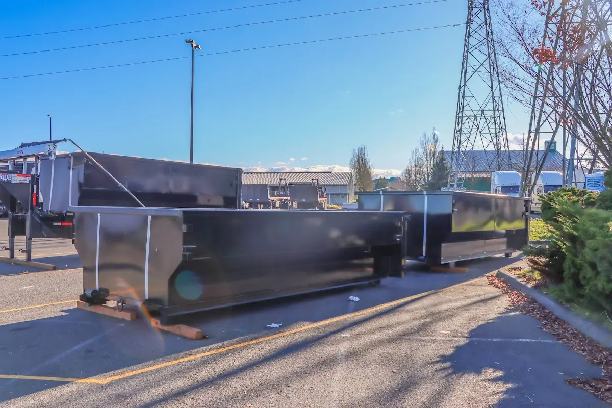 Roll-off dumpster ready for waste disposal at job site for 4 Yard Dumpster Rental in Palmer Town